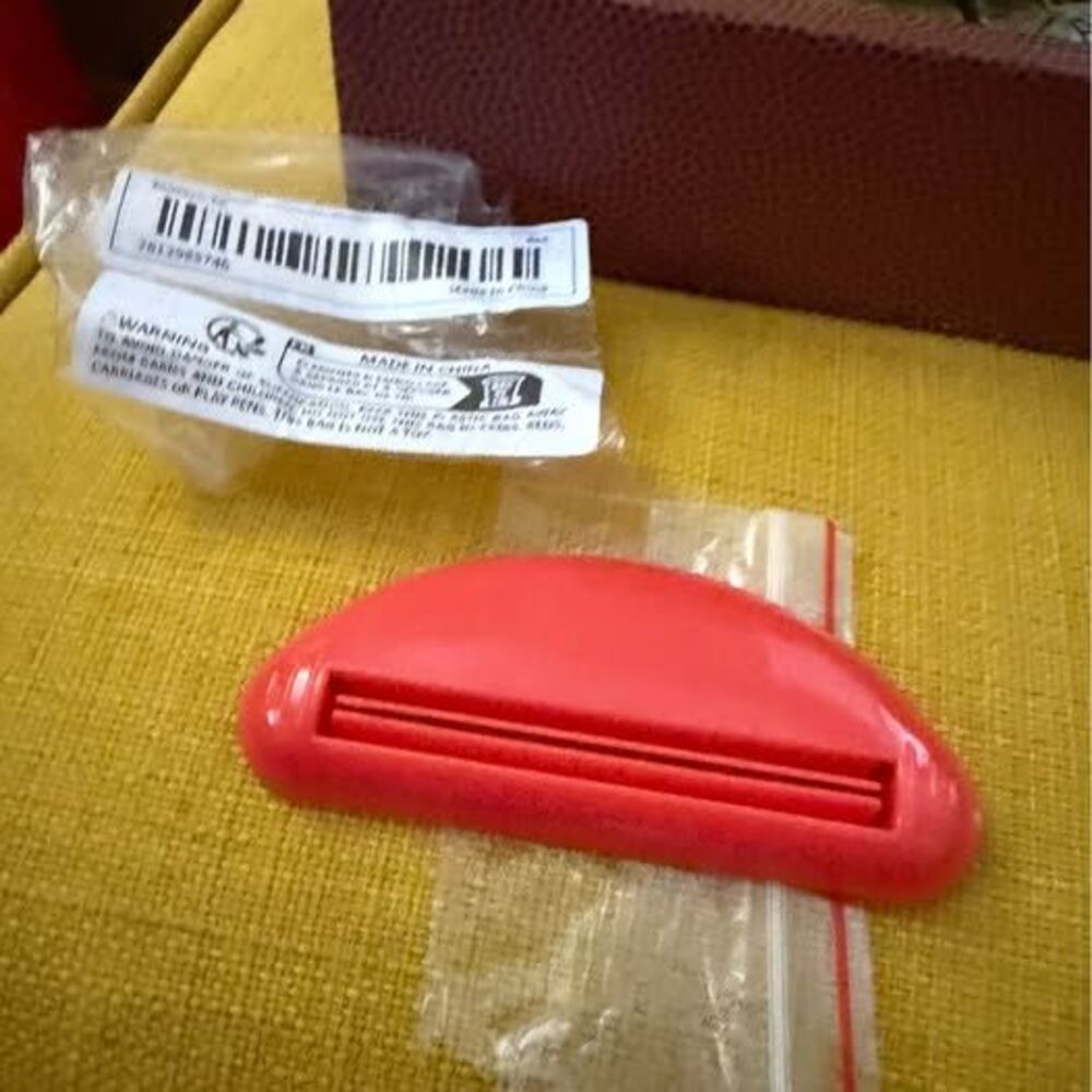 Red Plastic Toothpaste Tube Squeezer